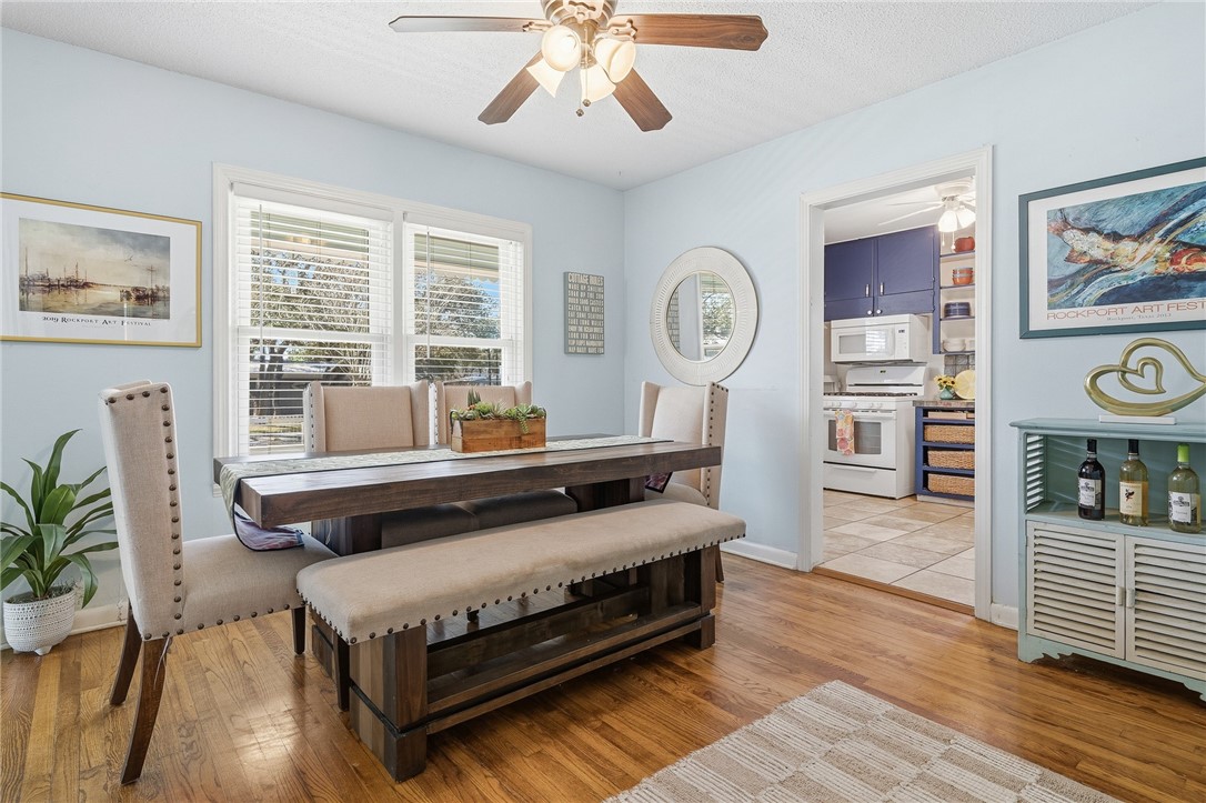 607 Chaparral Street Fulton, TX 78382 - Photo 9 of 40 a living room with furniture and wooden floor