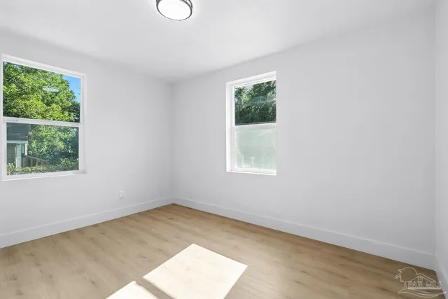 an empty room with windows