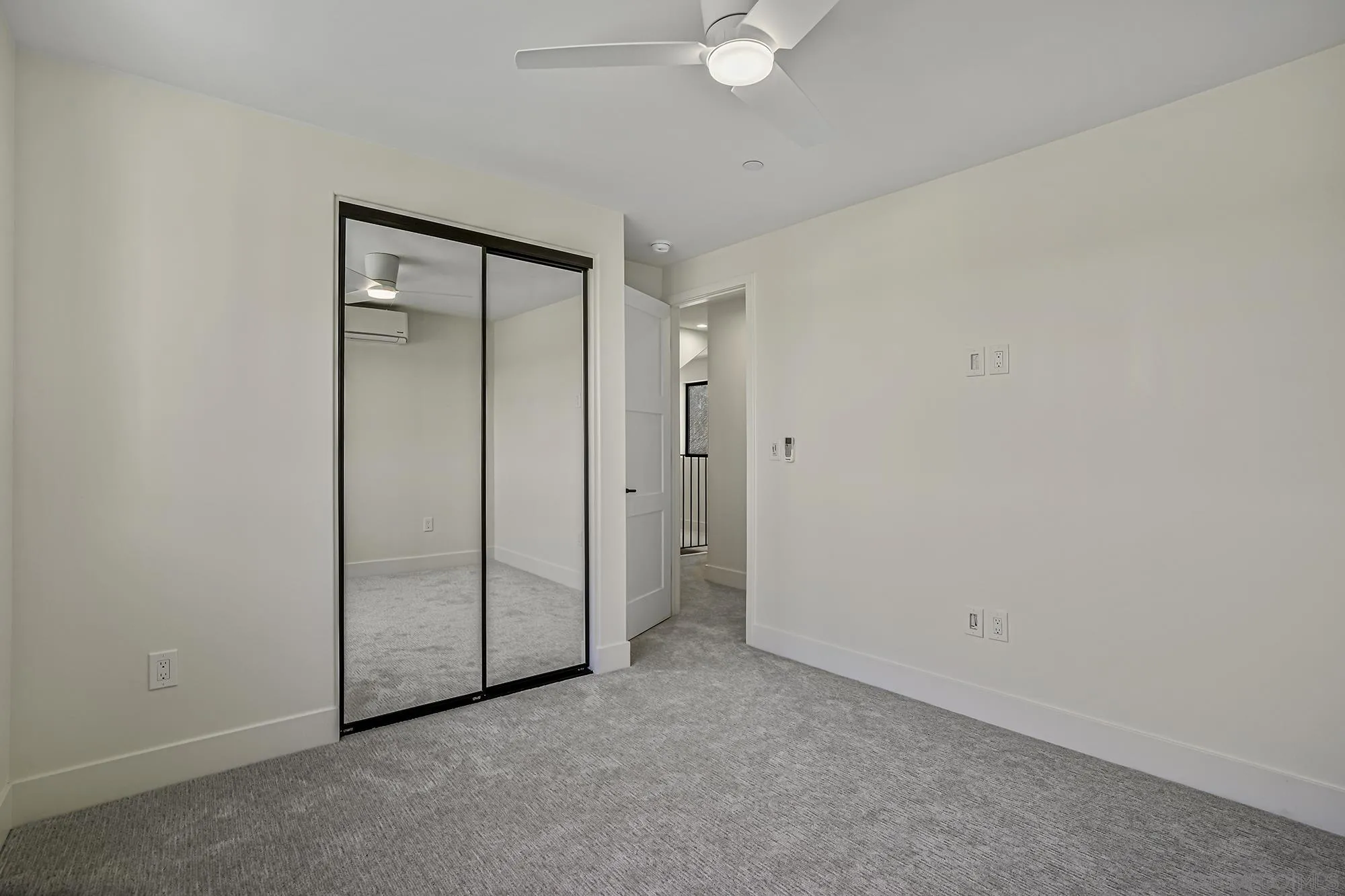 2124 San Clemente Street San Diego, CA 92107 - Photo 16 of 22 an empty room with a mirror