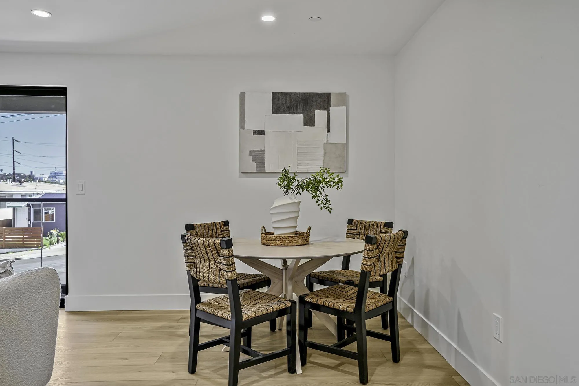 2124 San Clemente Street San Diego, CA 92107 - Photo 10 of 22 a view of a dining room with furniture and wooden floor