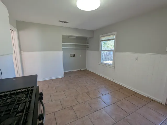a view of kitchen and window