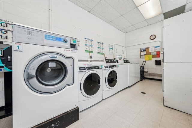 33 North Main Street, Unit 2E Lombard, IL 60148 - Photo 16 of 16 a utility room with dryer and washer