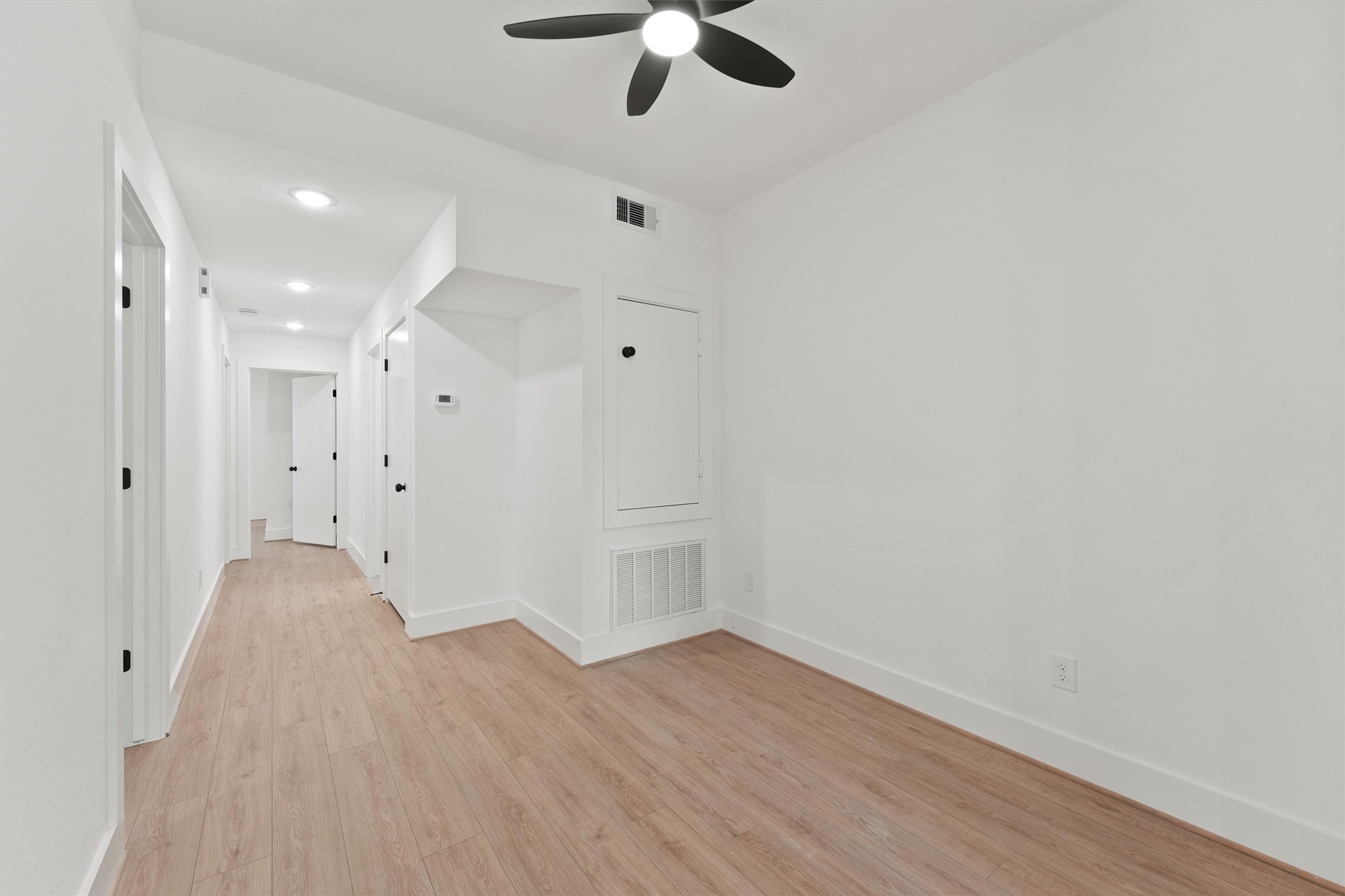 407 Calloway Street, Unit AB Houston, TX 77029 - Photo 14 of 19 wooden floor in an empty room