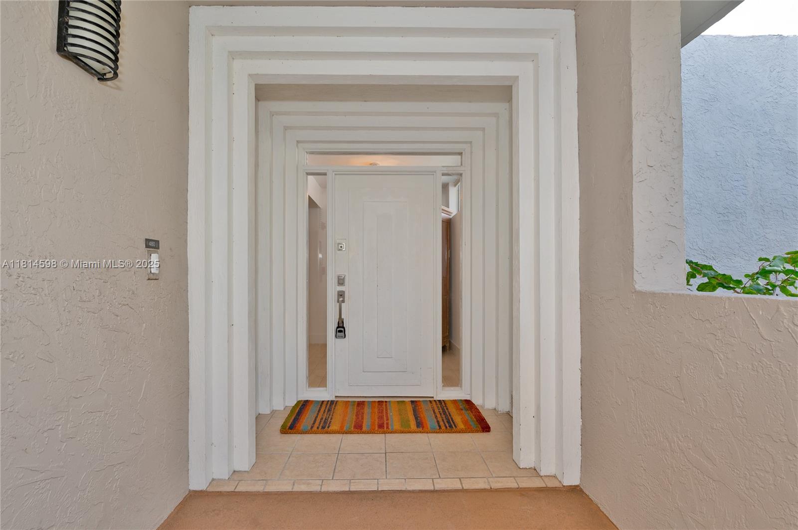 101 Crandon Boulevard, Unit 480 Key Biscayne, FL 33149 - Photo 2 of 28 a view of front door with a couch