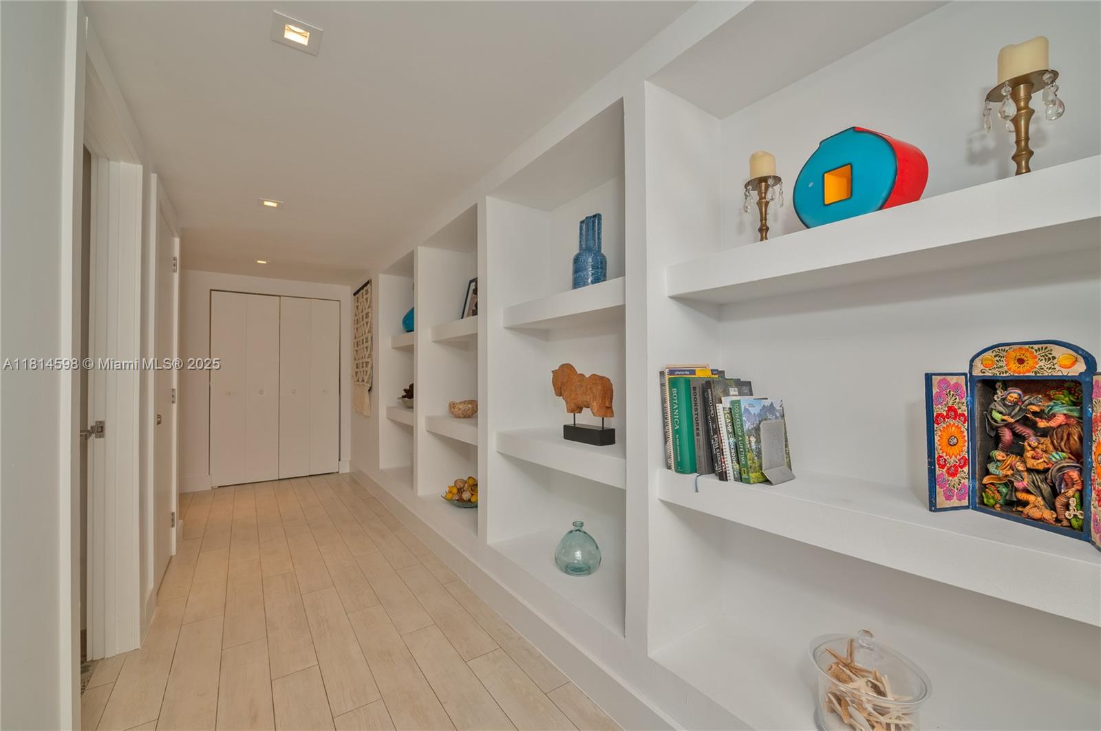 101 Crandon Boulevard, Unit 480 Key Biscayne, FL 33149 - Photo 4 of 28 a view of an entryway with wooden floor