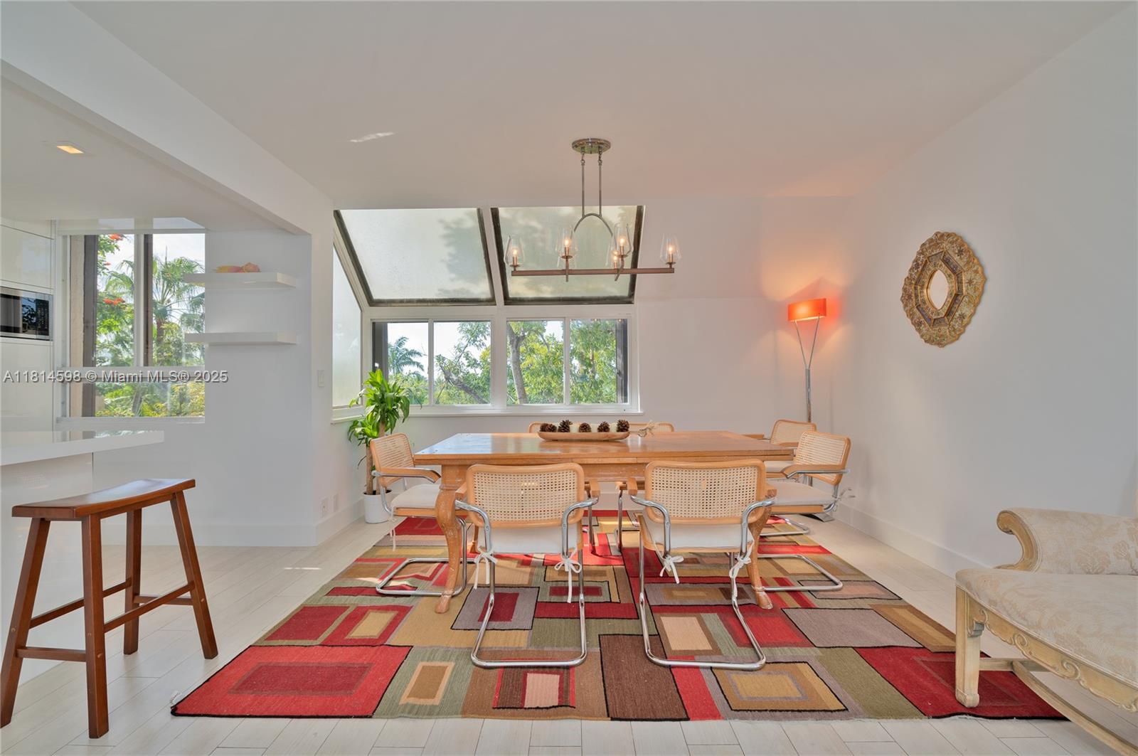 101 Crandon Boulevard, Unit 480 Key Biscayne, FL 33149 - Photo 8 of 28 a very nice looking room with a large window