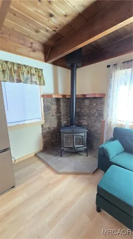 a bathroom with a sink vanity and toilet