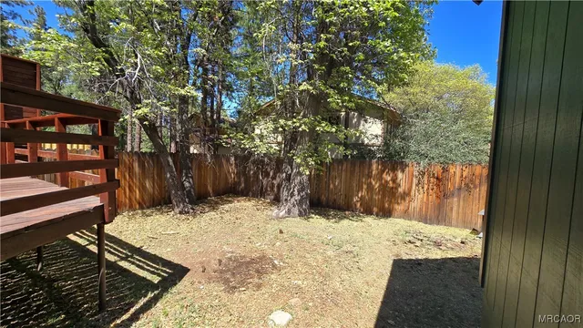 a stove top oven sitting inside of a kitchen