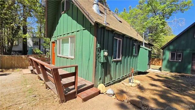 a view of an empty room and a window