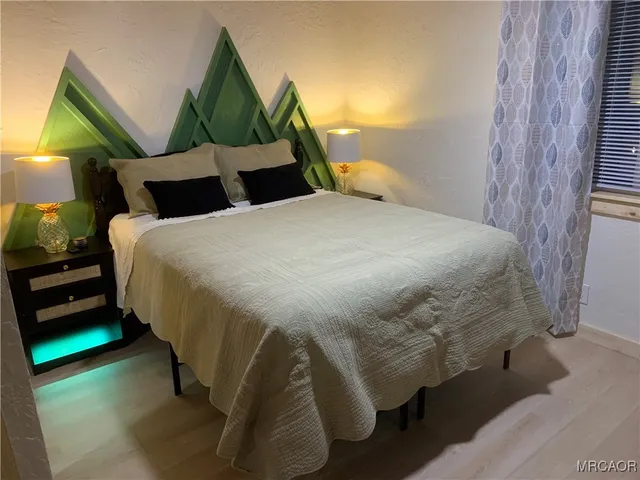 a view of entryway with stairs and wooden floor