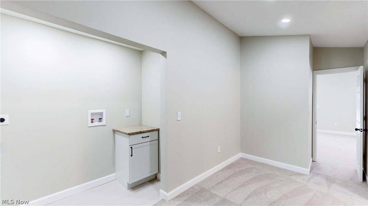 3312 Bancroft Road Akron, OH 44333 - Photo 23 of 50 Laundry area featuring hookup for a washing machine, cabinet space, electric dryer hookup, light carpet, and recessed lighting