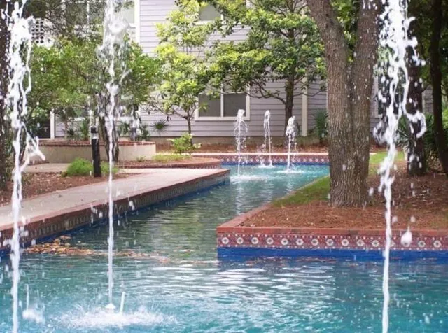 a view of a patio with a yard