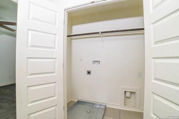 a view of an empty walk in closet