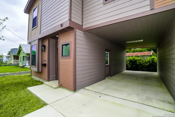 a view of a back yard of the house
