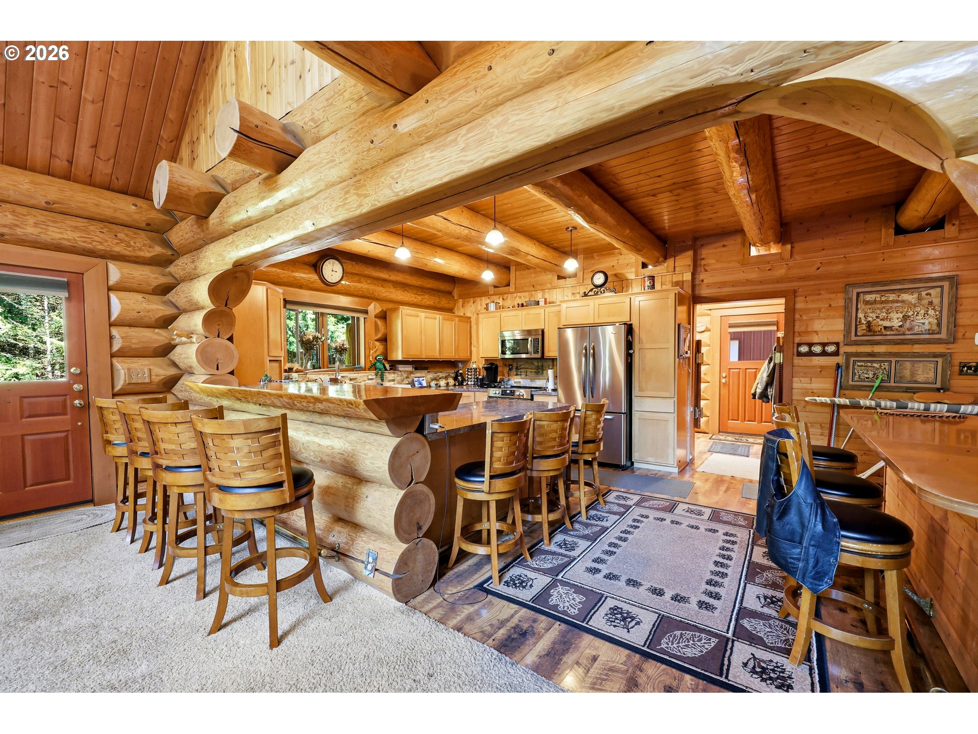 390 Spruce Creek Road Longview, WA 98632 - Photo 18 of 45 a dining hall with lots of tables and chairs