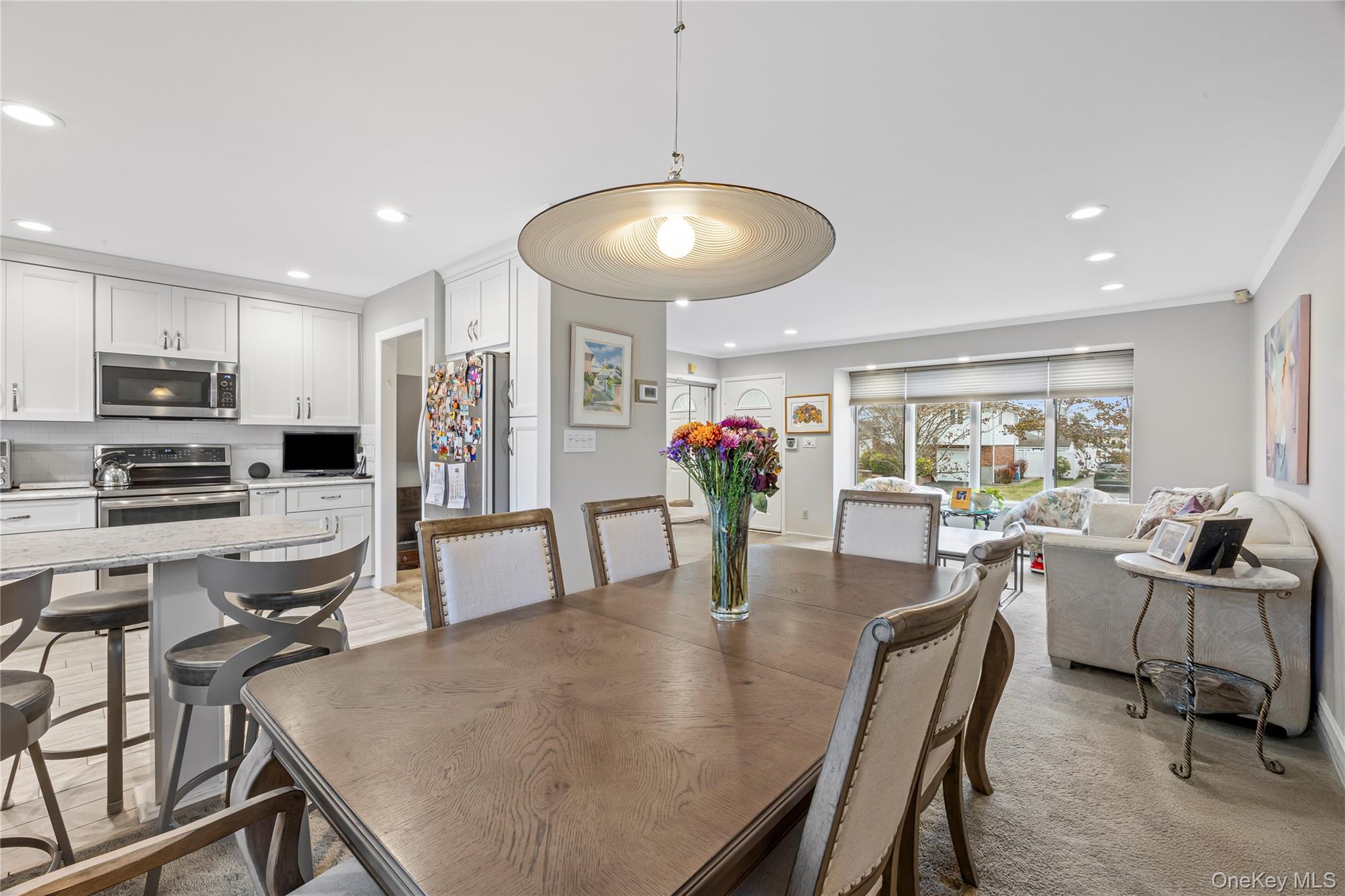 18 Roxbury Avenue Plainview, NY 11803 - Photo 5 of 23 Dining Area open to Kitchen