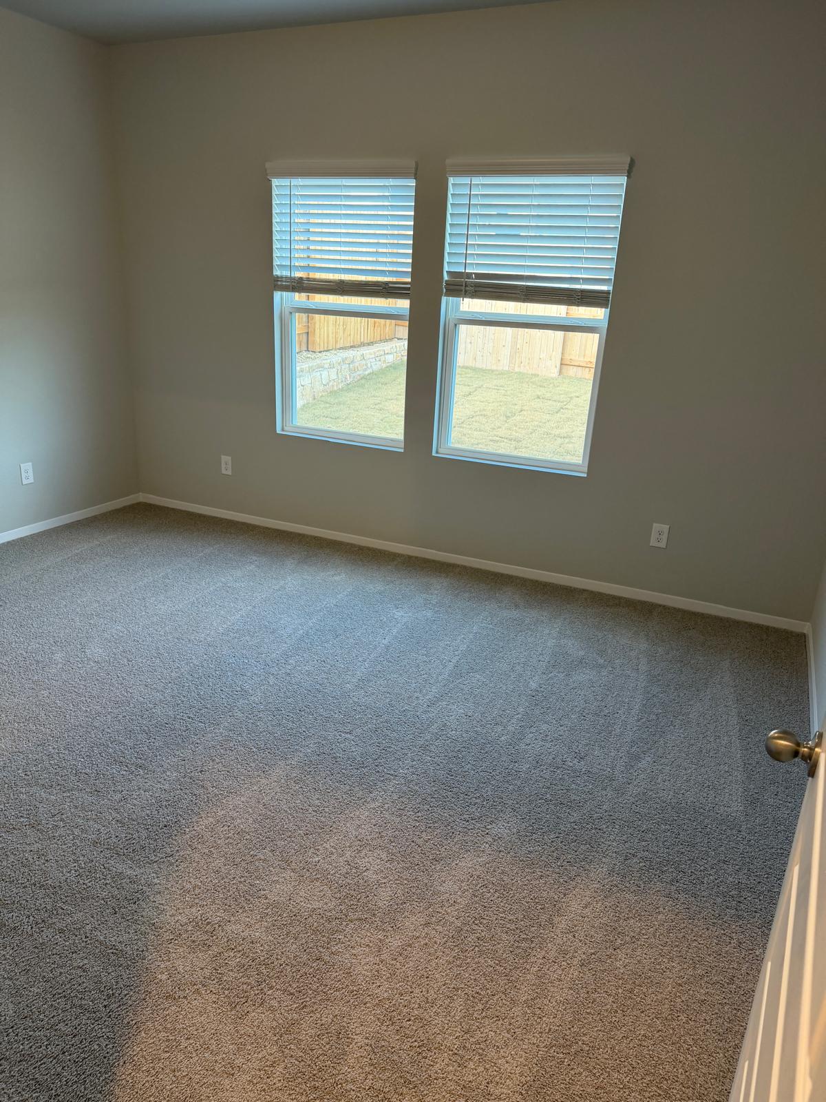 2708 Towy Road Pflugerville, TX 78660 - Photo 17 of 34 an empty room with windows