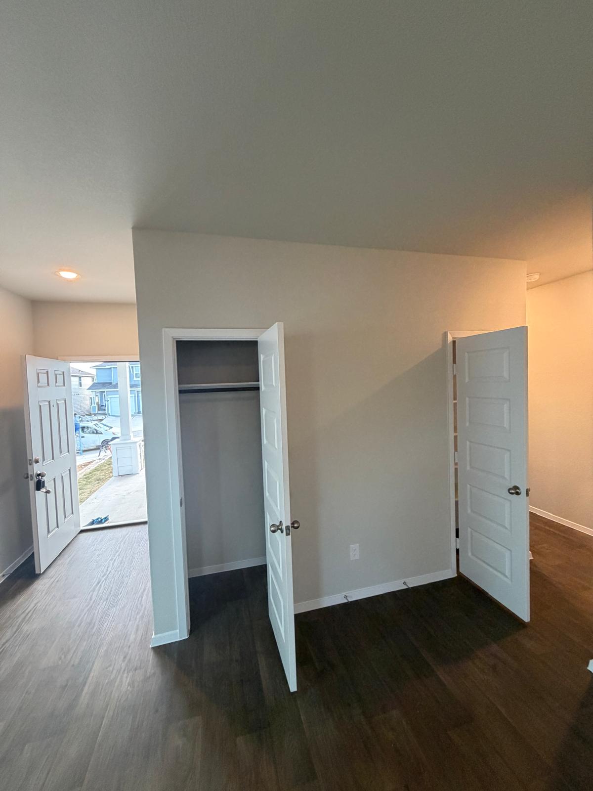 2708 Towy Road Pflugerville, TX 78660 - Photo 33 of 34 an empty room with wooden floor and closet