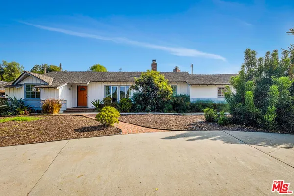 a view of a house with a patio