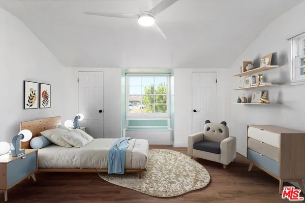 a bedroom with furniture and a couch