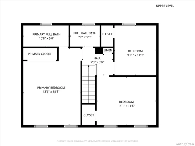 aerial view of a house with a yard and potted plants