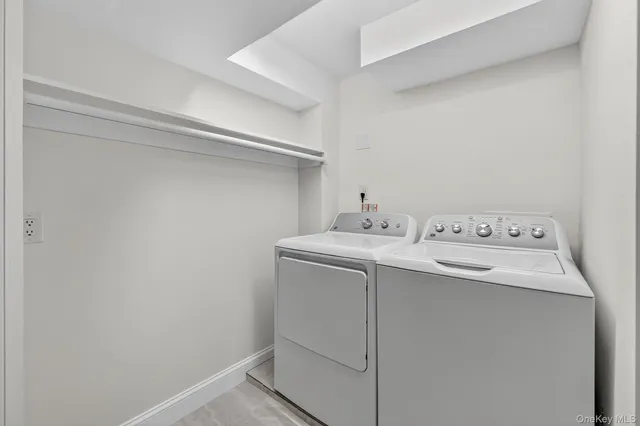 a view of a chair and tables in the backyard