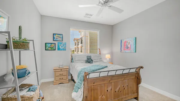 a bedroom with a bed and furniture
