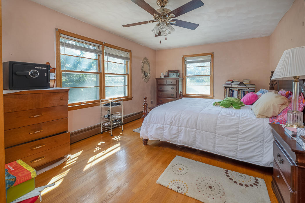 3147 Blue Ridge Boulevard Blue Ridge, VA 24064 - Photo 14 of 57 a bedroom with a bed and wooden floor