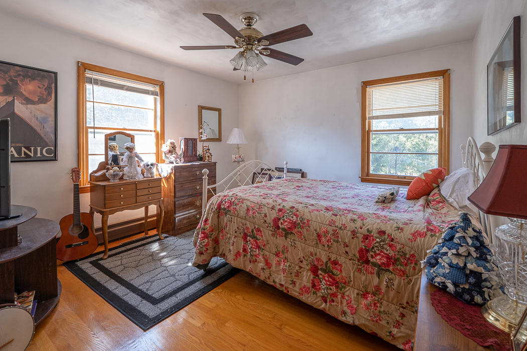 3147 Blue Ridge Boulevard Blue Ridge, VA 24064 - Photo 20 of 57 a bed sitting in a bedroom next to a window