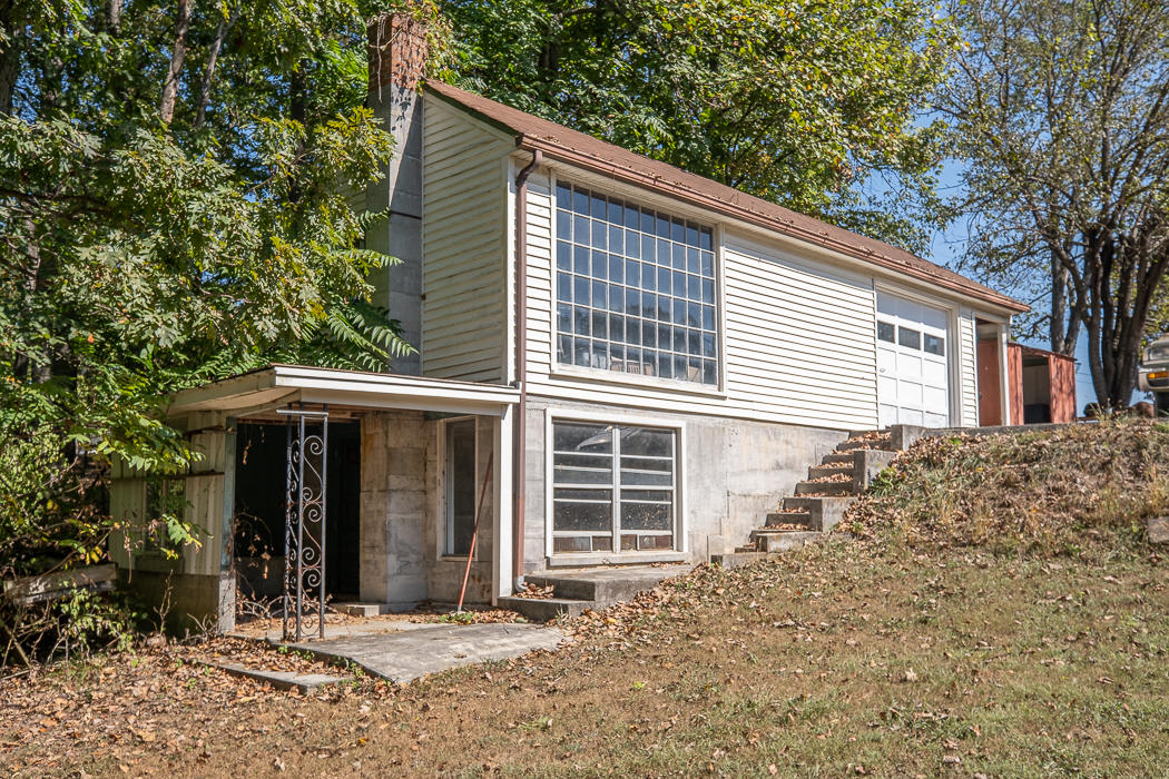 3147 Blue Ridge Boulevard Blue Ridge, VA 24064 - Photo 35 of 57 a front view of a house with a yard