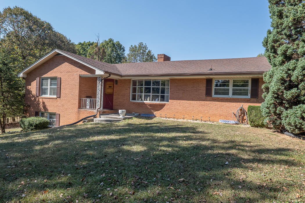 3147 Blue Ridge Boulevard Blue Ridge, VA 24064 - Photo 37 of 57 a front view of house with yard and trees around