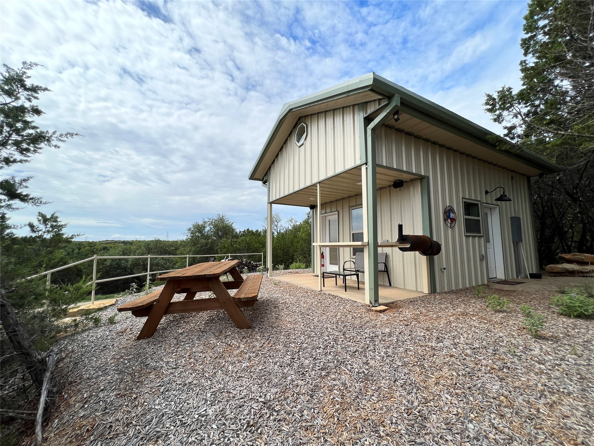 4636 Halsell Ranch Road Jacksboro, TX 76458 - Photo 39 of 39 a view of sitting area with furniture and wooden fence