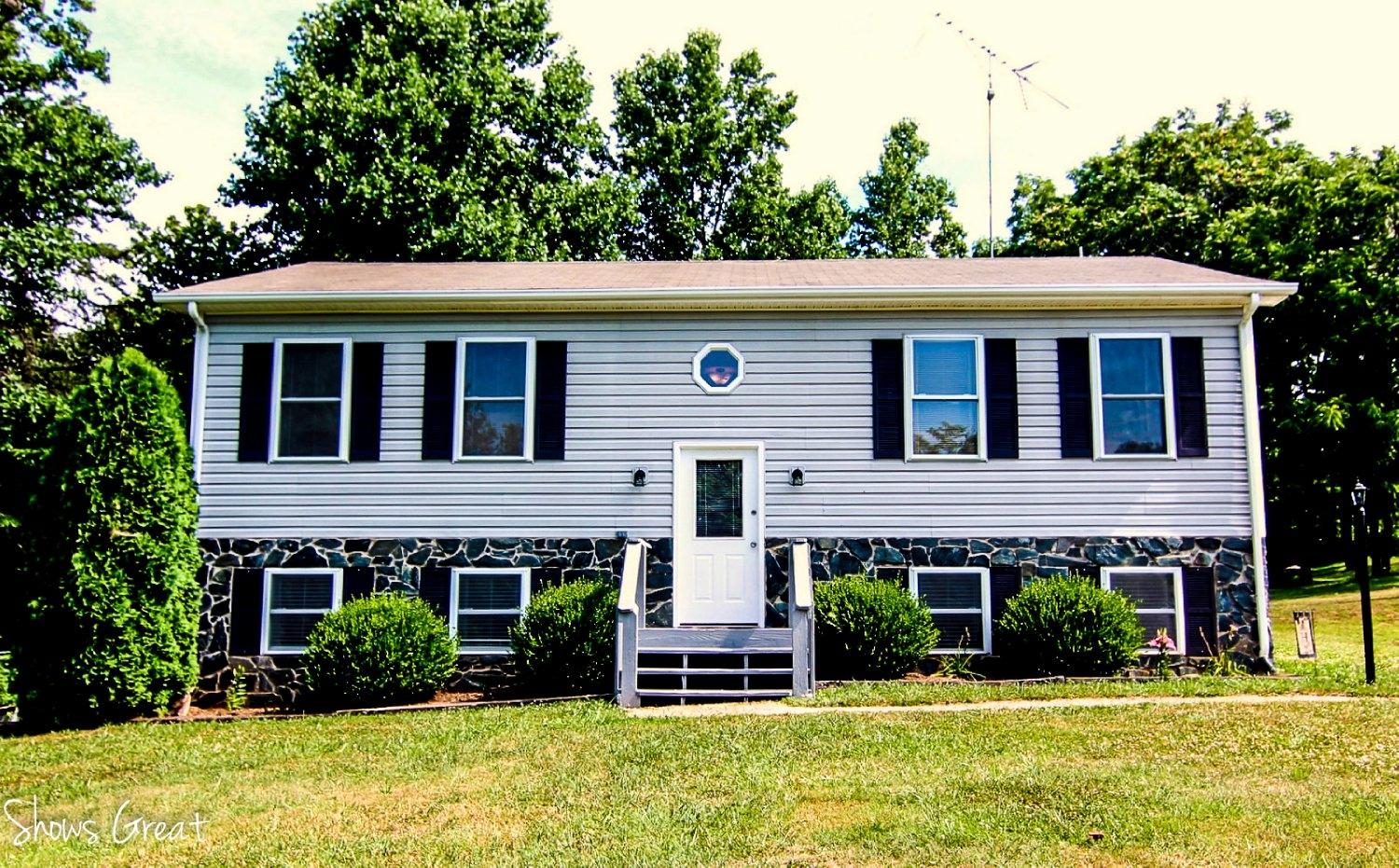 2973 Old Forge Road Callaway, VA 24067 - Photo 1 of 22 a front view of a house with garden