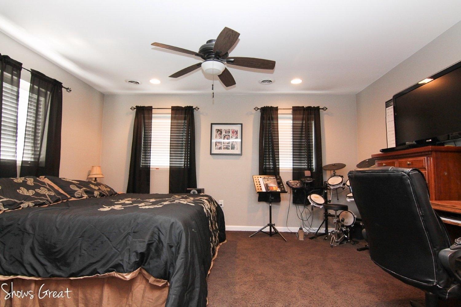 2973 Old Forge Road Callaway, VA 24067 - Photo 14 of 22 a bed room with furniture and a flat screen tv
