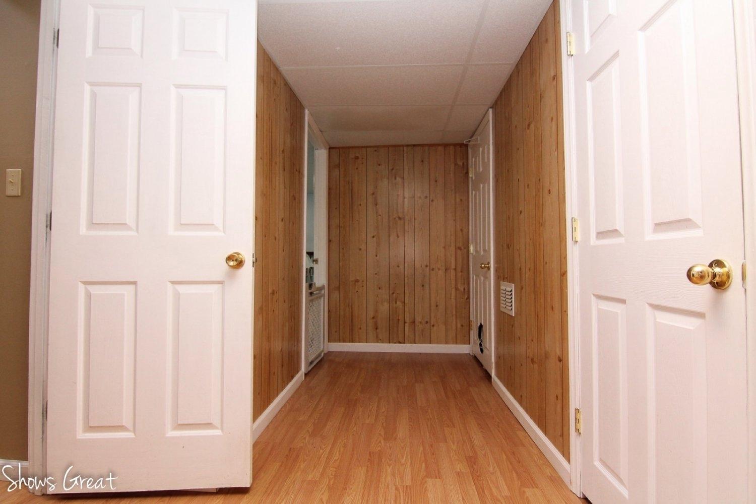 2973 Old Forge Road Callaway, VA 24067 - Photo 17 of 22 a view of a hallway with wooden floor and staircase