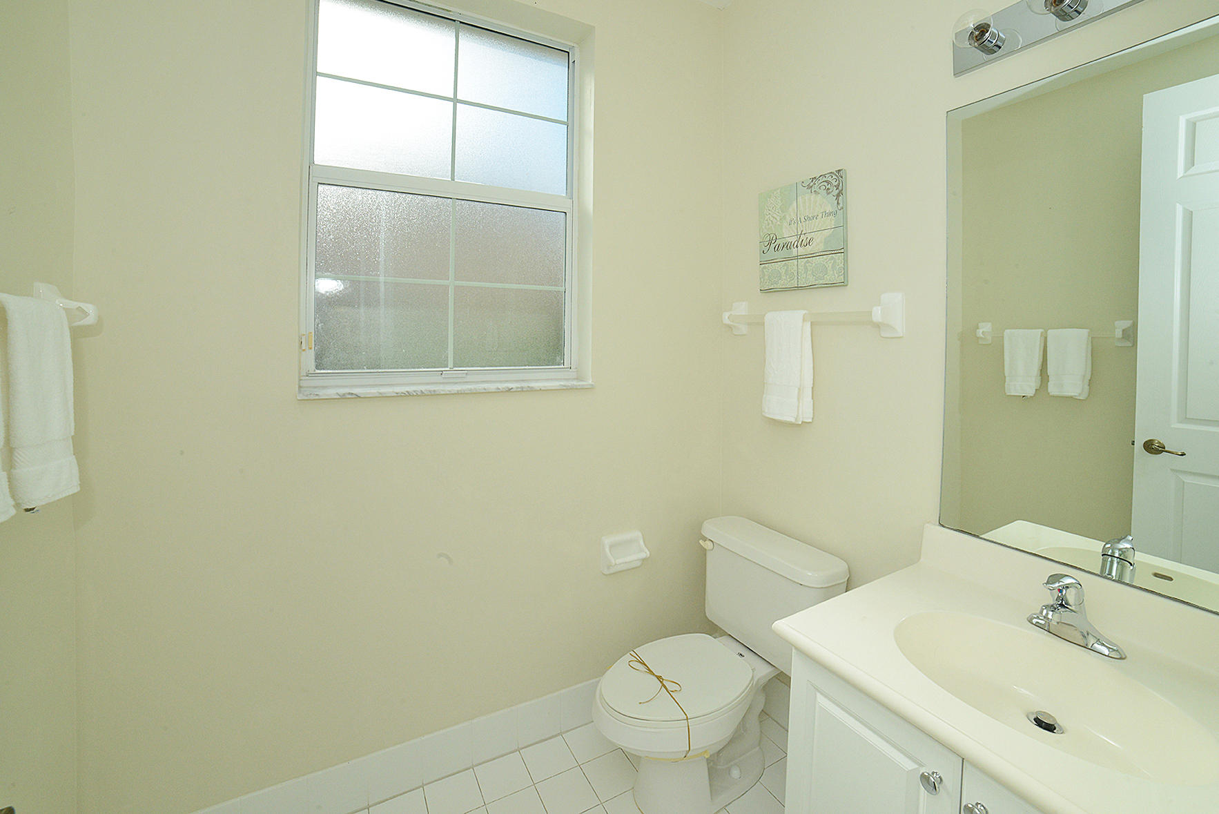 4286 West Main Street Jupiter, FL 33458 - Photo 16 of 30 Powder room on 2nd floor