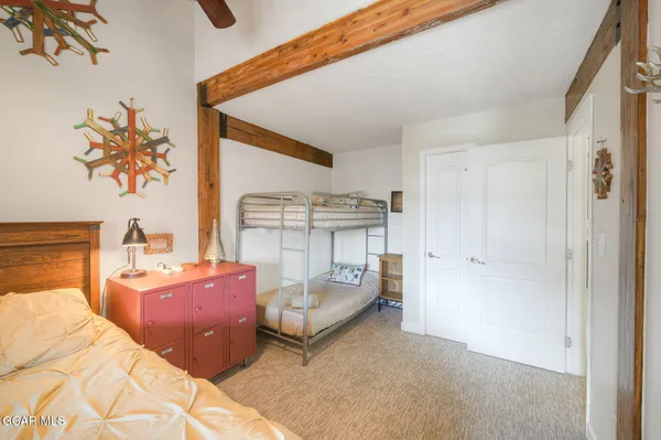 a bed room with a bed and a couch