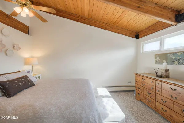 a spacious bathroom with a double vanity sink and a mirror