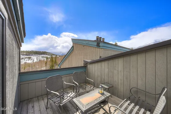 a balcony view with a sink