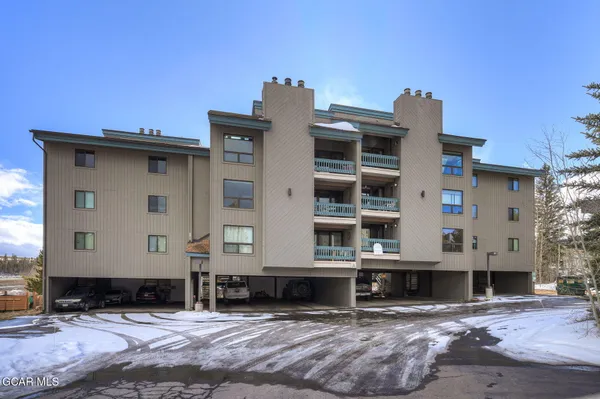 a front view of a building with glass windows