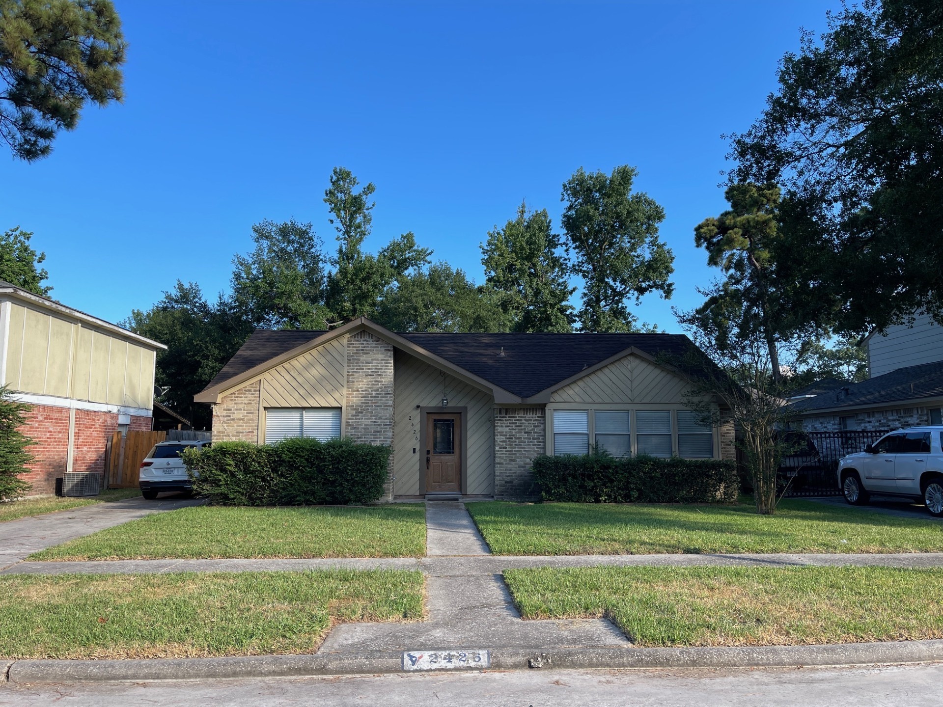2426 Summer Spring Drive Spring, TX 77373 - Photo 2 of 24 a front view of a house with a garden