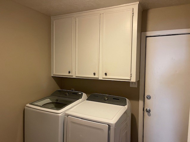 2426 Summer Spring Drive Spring, TX 77373 - Photo 10 of 24 a view of storage and utility room with washer and dryer
