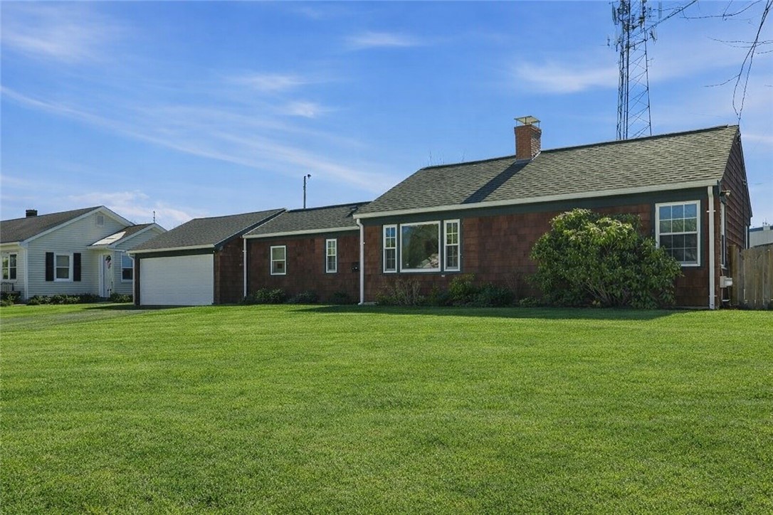 57 Warren Avenue Tiverton, RI 02878 - Photo 2 of 37 Grass is AI generate