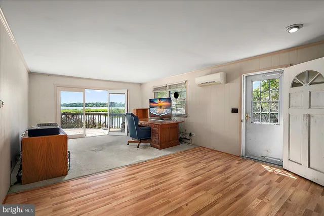 a workspace with furniture and window