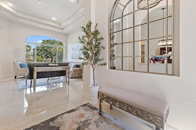 a bathroom with a double vanity sink a mirror and shower
