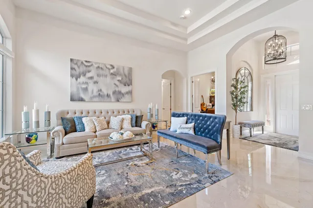 a bed room with a bed and a chair