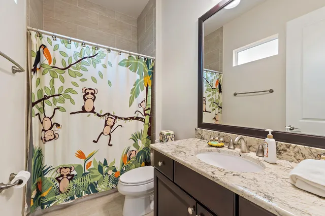 an aerial view of a house with yard swimming pool and outdoor seating