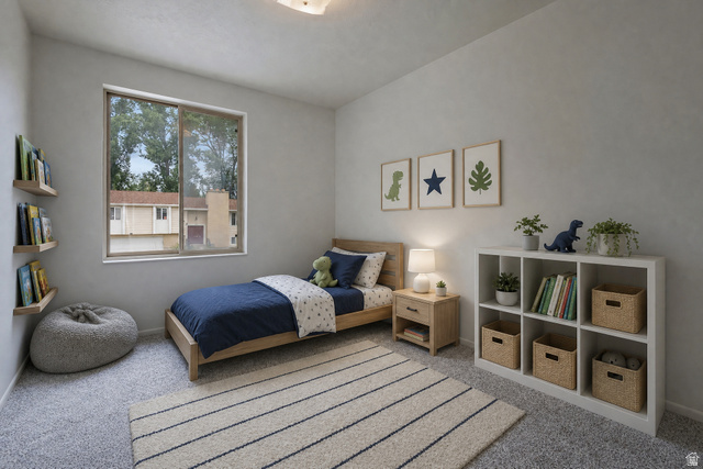 1722 Kimsbrough Road Sandy, UT 84092 - Photo 19 of 29 Bright bedroom featuring light gray walls, plush gray carpet, a spacious window, and built-in floating shelves