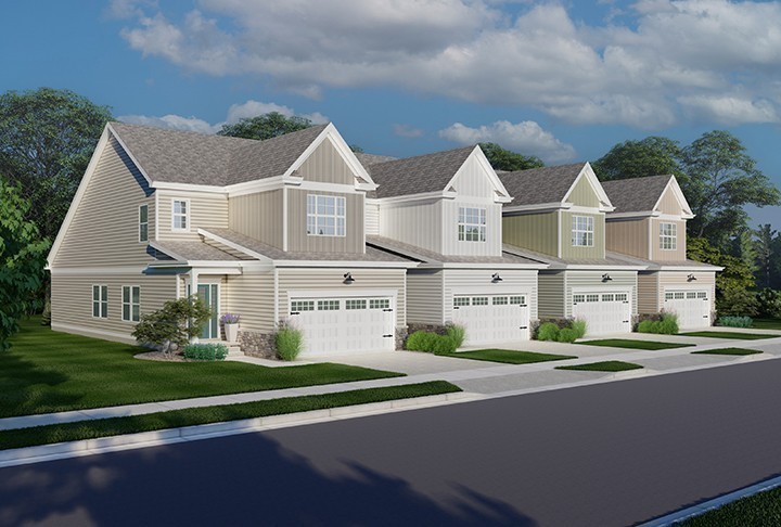 a view of multiple houses with a big yard and large trees