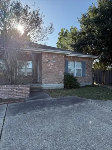 a view of backyard with green space